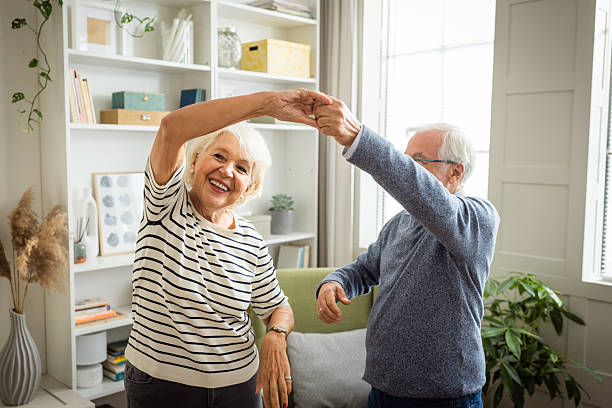 istock Senior couple at home dancing 2225665724