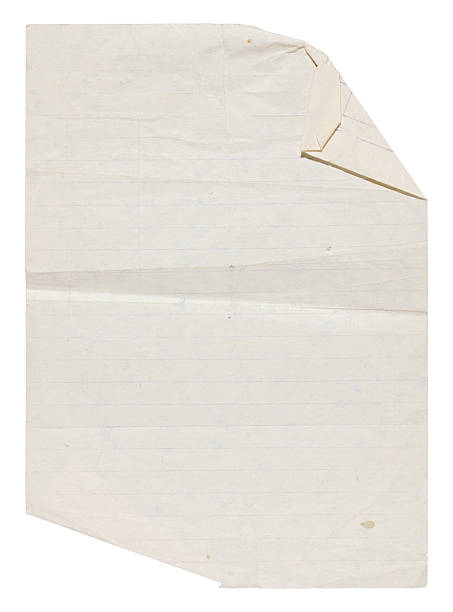 istock Yellowed old vintage paper, isolated notebook lined sheet with folded corners 2225667985