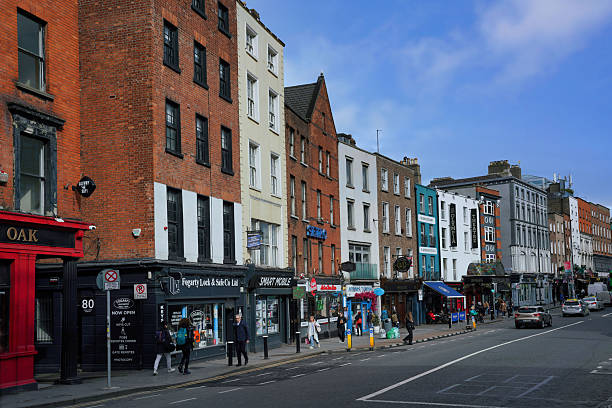Dublin Ireland - March 20, 2023:  Shops on Dame Street in Dublin with people walking