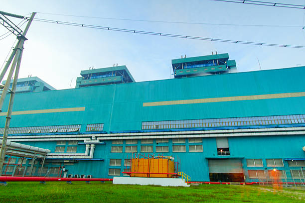 istock Industrial complex featuring a large turquoise building and infrastructure details showcasing 2225683276