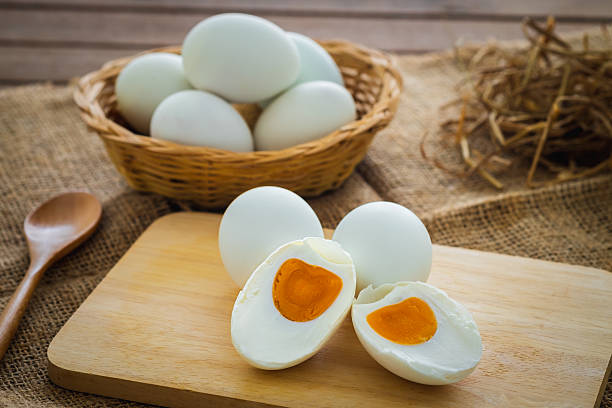 istock Salted duck eggs on wooden board 2225690766