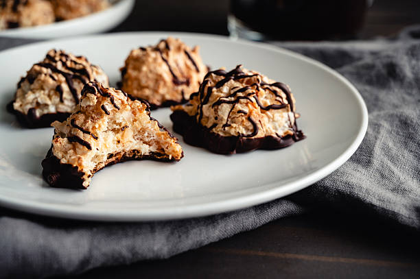 istock Macaroons Drizzled with Dark Chocolate on a Small Plate 2225704107