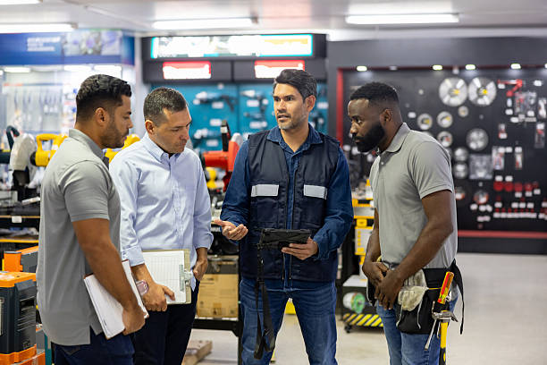 istock Business manager talking to his staff while working at a hardware store 2225706064
