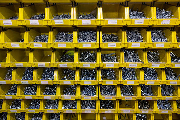 Close-up on screws at a hardware store stored in boxes - retail display at a small business