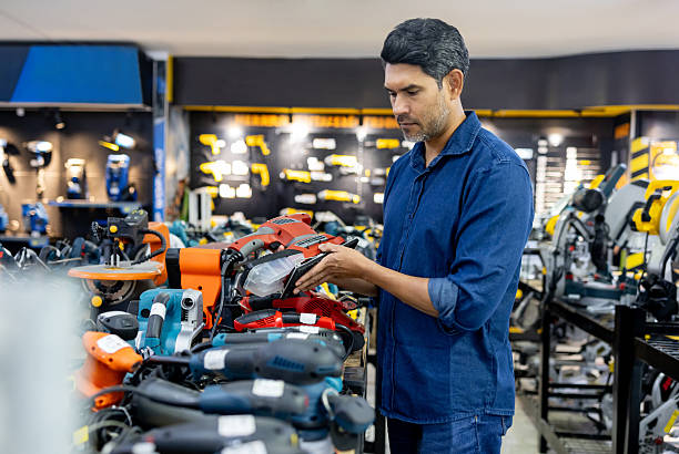 istock Man looking at sanders at a hardware store 2225706196