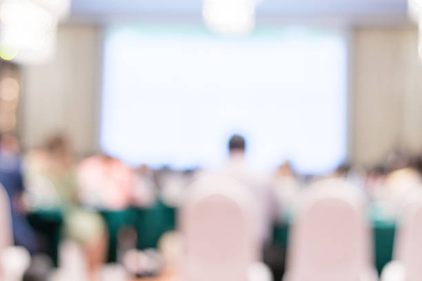 istock softly blurred view of a modern conference room filled with ambient lighting 2225710595