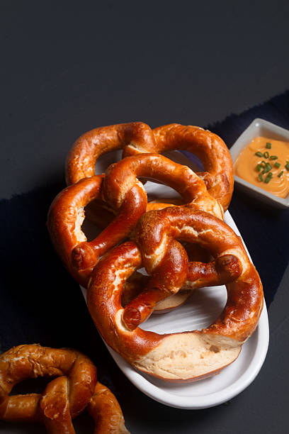 istock Food concept soft pretzel on black background with copy space 2225710900
