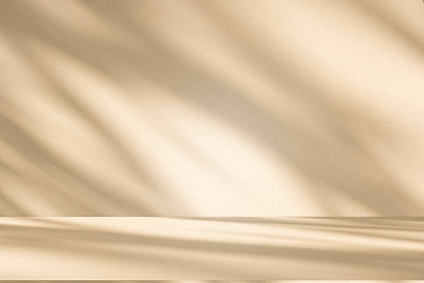 istock Studio style background wall decoration presentation uses white and beige tones. with shadows cast from a nearby window, concept creating a decorative 2225716583