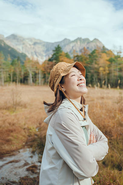 mindful mountain serenity experiencing quiet luxury travel amidst breathtaking autumn landscapes and pristine nature  at Kamikochi Nagano Japan