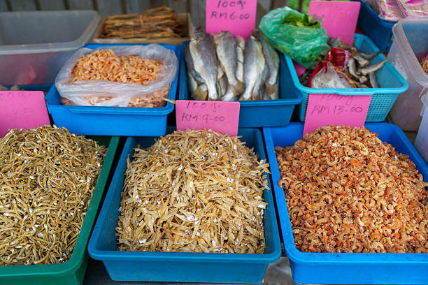 istock Various dried seafood in market trays 2225723513