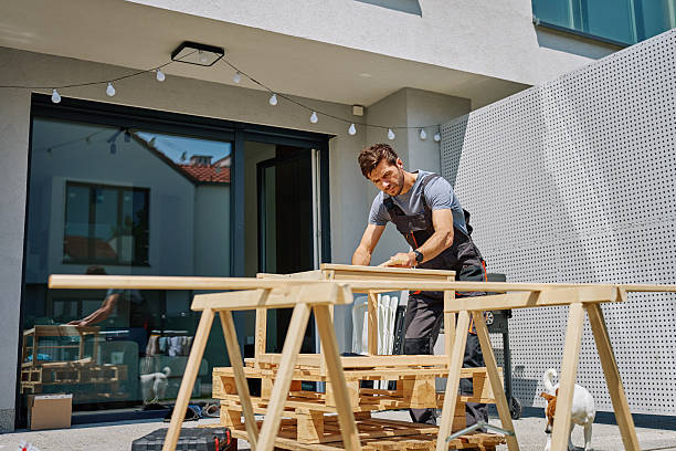 istock Carpenter measuring wooden board outdoors 2225724457