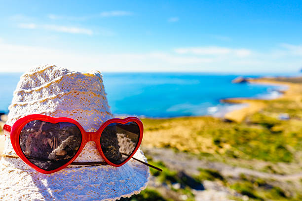 Summer hat on seacoast. Coastal spanish landscape, Calblanque Park in Murcia Spain. Hiking, activity on holidays.