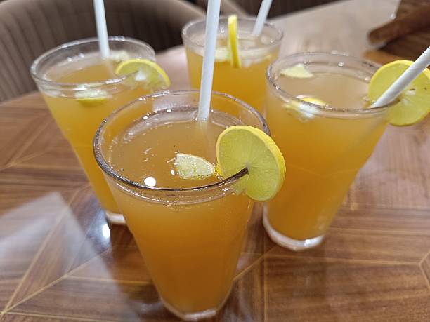 A glass of Ec Sweet Tea at the food stall table