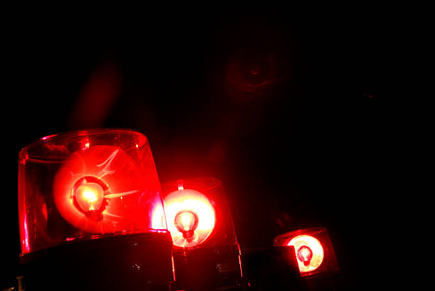 istock A red police light that glows in the dark 2225730681