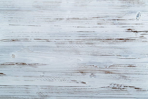 istock Texture of wooden board with white paint 2225733490