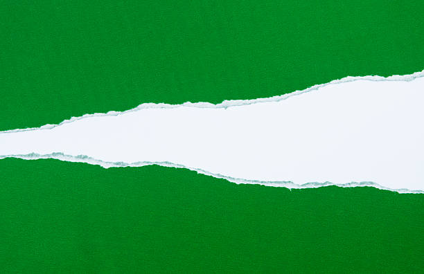 ripped white paper against a red background
