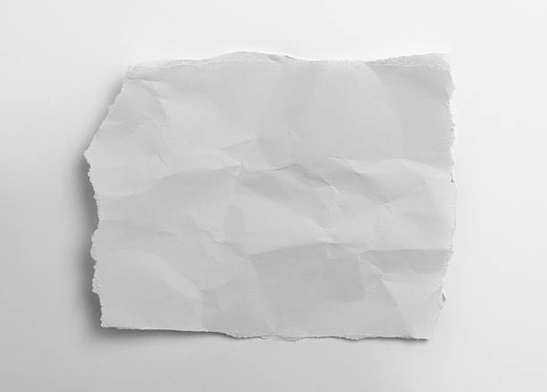 istock Crumpled white paper sheet on white background 2225733525