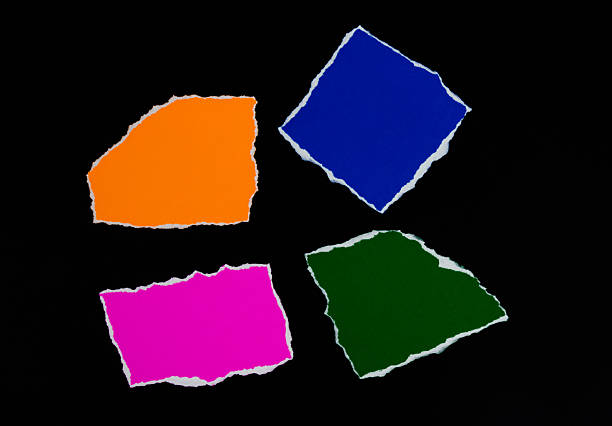 Colorful paper sheets on black background