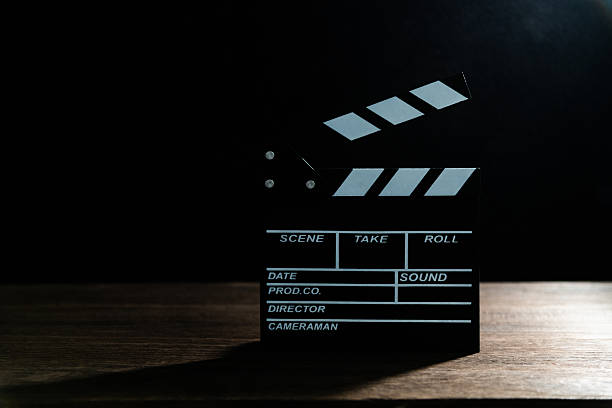 istock Film slate on the wooden table 2225733624