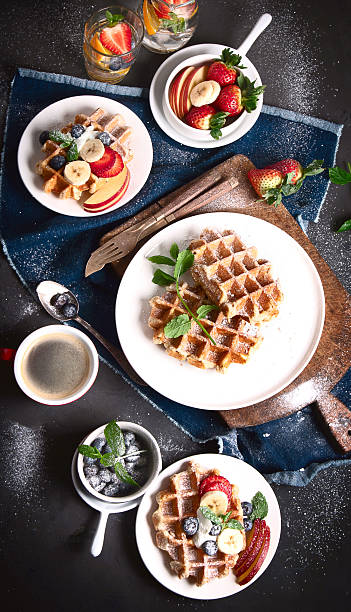 istock Traditional belgian waffles with fresh berries 2225734669
