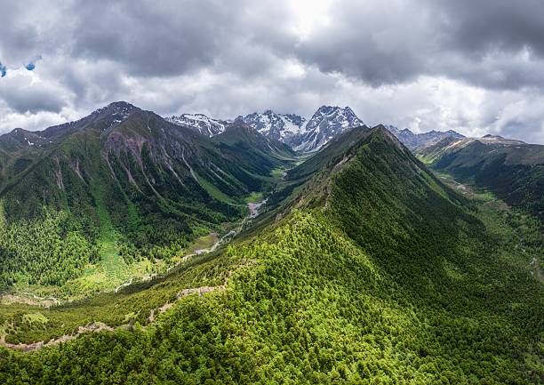 istock Panoramic View of Baima Snow Mountain's U-shaped valley 2225735034