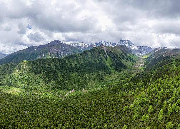 istock Panoramic View of Baima Snow Mountain's U-shaped valley 2225735035