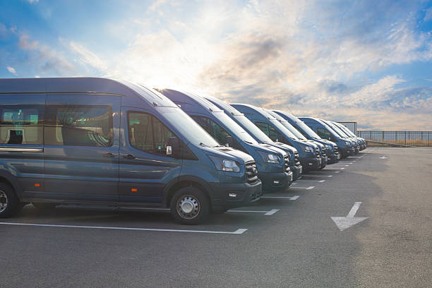 istock Series of new vans are parked in rows 2225739254