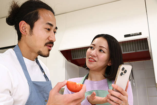 Couple cooking together in the kitchen