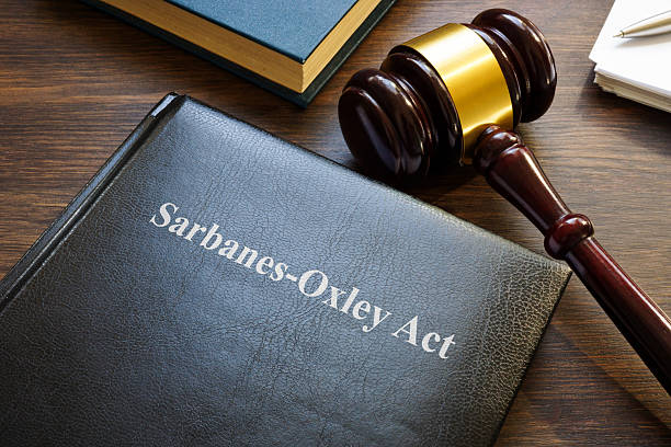 istock Sarbanes-Oxley act. A book with laws and gavel on the table. 2225749614