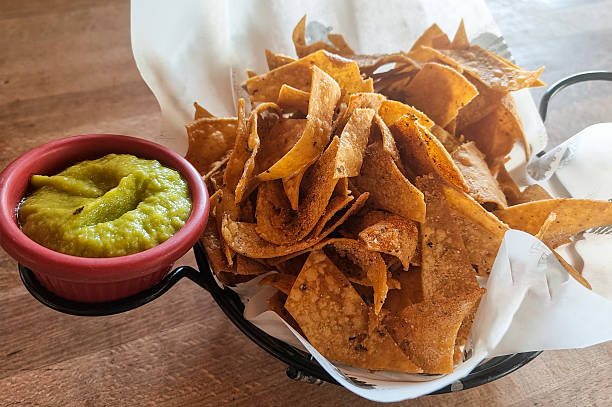 istock A delicious authentic mexican guacamole dip with chips and avocado 2225750624