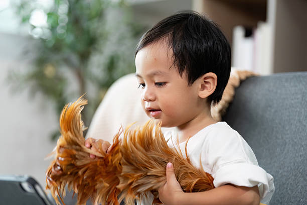 Child Playing with Toy Fur, Indoor Fun and Creativity