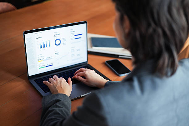 istock Professional Businesswoman Using Laptop for Data Analysis and Presentations 2225770353