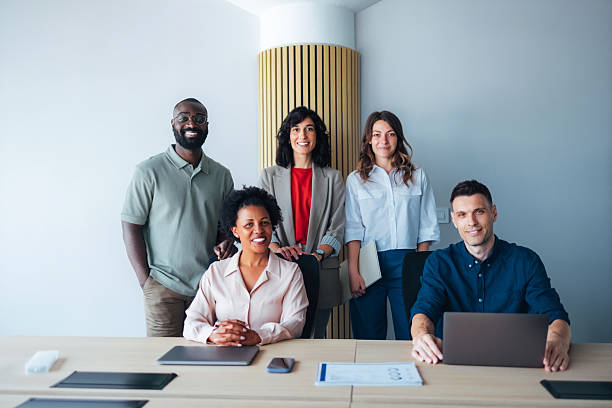 istock Diverse Group of Professionals Collaborating in a Modern Office Environment 2225770882