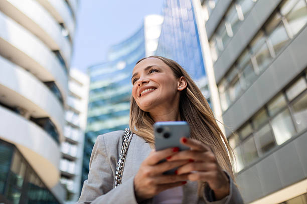 istock Businesswoman Enjoying Productive Call Under Open Sky 2225771479