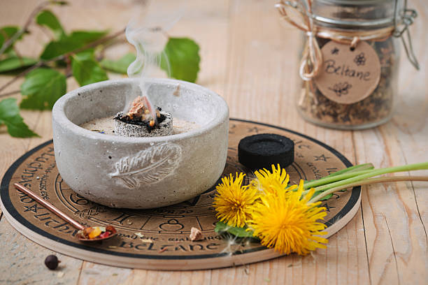 istock Incense burning on glowing coal - holy smoke ritual on Beltane 2225772573