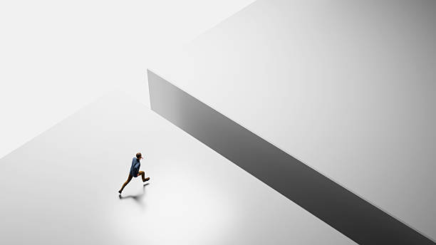 istock Businessman running on white surface towards a gap representing challenge in business 2225781079