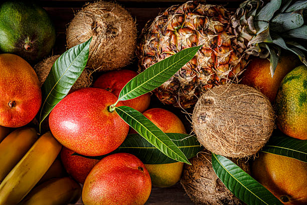 istock Top view assortment of tropical fruits on a table in rustic kitchen. 2225782192