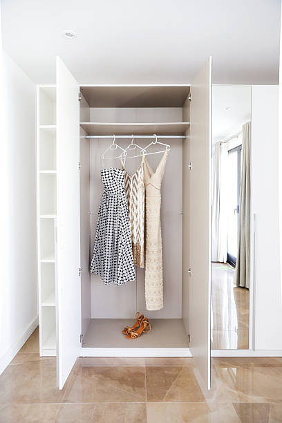 istock Wardrobe with Dresses and Shoes 2225782269