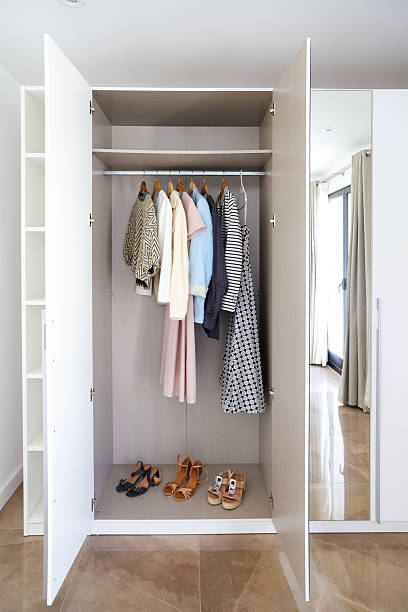 istock Wardrobe with Clothes and Shoes 2225782292