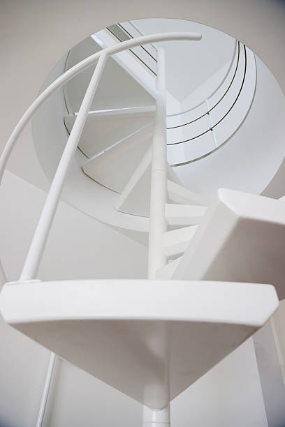 istock View Up White Spiral Staircase With Clean Design 2225782341