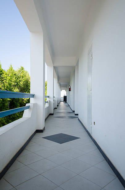 istock Hotel corridor with trees and blue sky view 2225787772