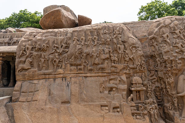 istock A large rock with a carving of people on it 2225789940