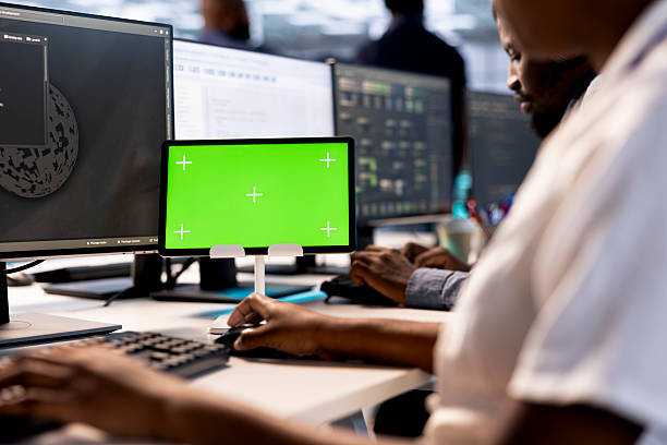 istock Close up of worker safeguarding data center using mockup tablet 2225790738