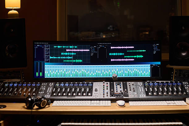 istock Professional Audio Engineer Mixing Tracks in Modern Recording Studio 2225793012