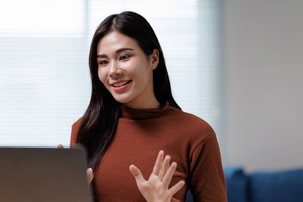istock Young asian woman working from home having video conference call 2225794065