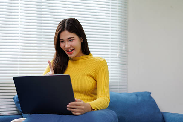 istock Young asian woman working from home having a video call 2225794114