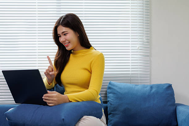 istock Young asian woman working from home having a video call 2225794119
