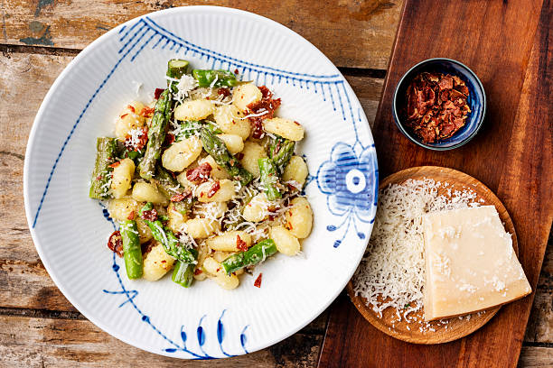 istock Asparagus gnocchi with prosciutto. 2225795888