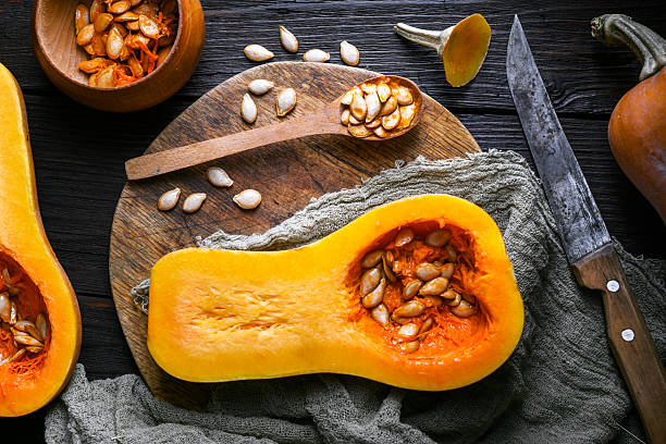istock Flat lay of raw butternut squash with rustic cutlery 2225796024