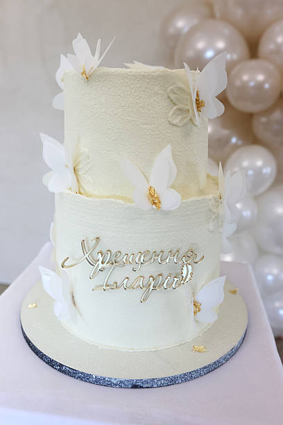 istock A beautiful cake with an angel for a baptism. 2225797545